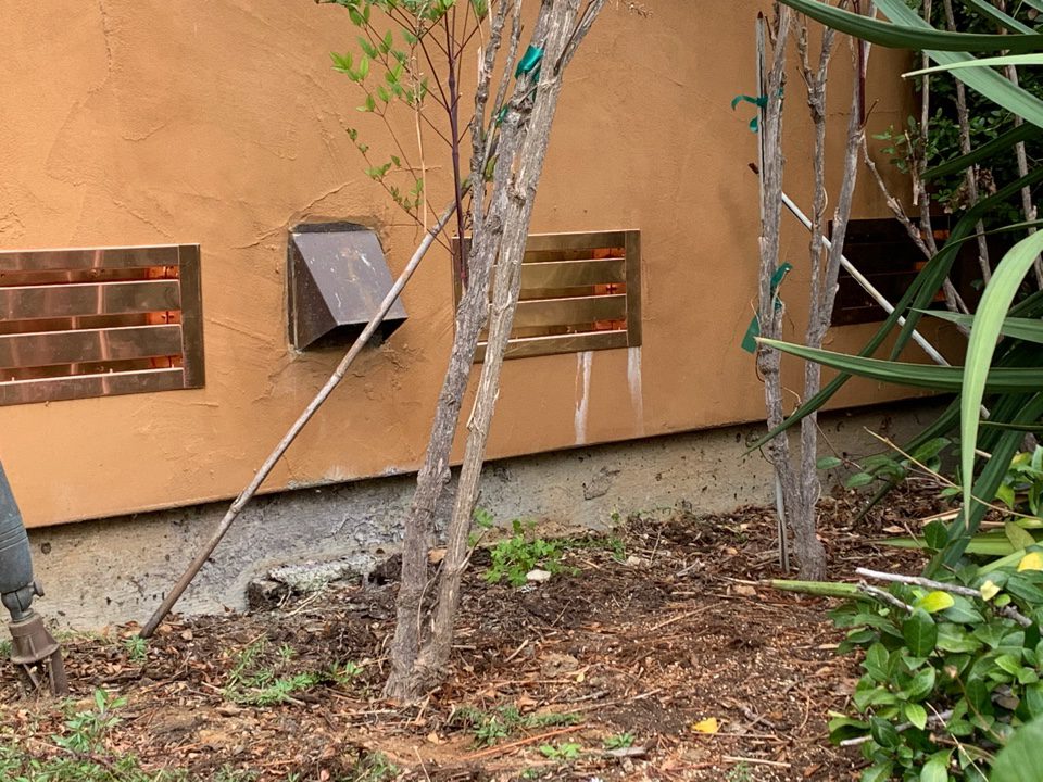 Copper foundation vents in California home